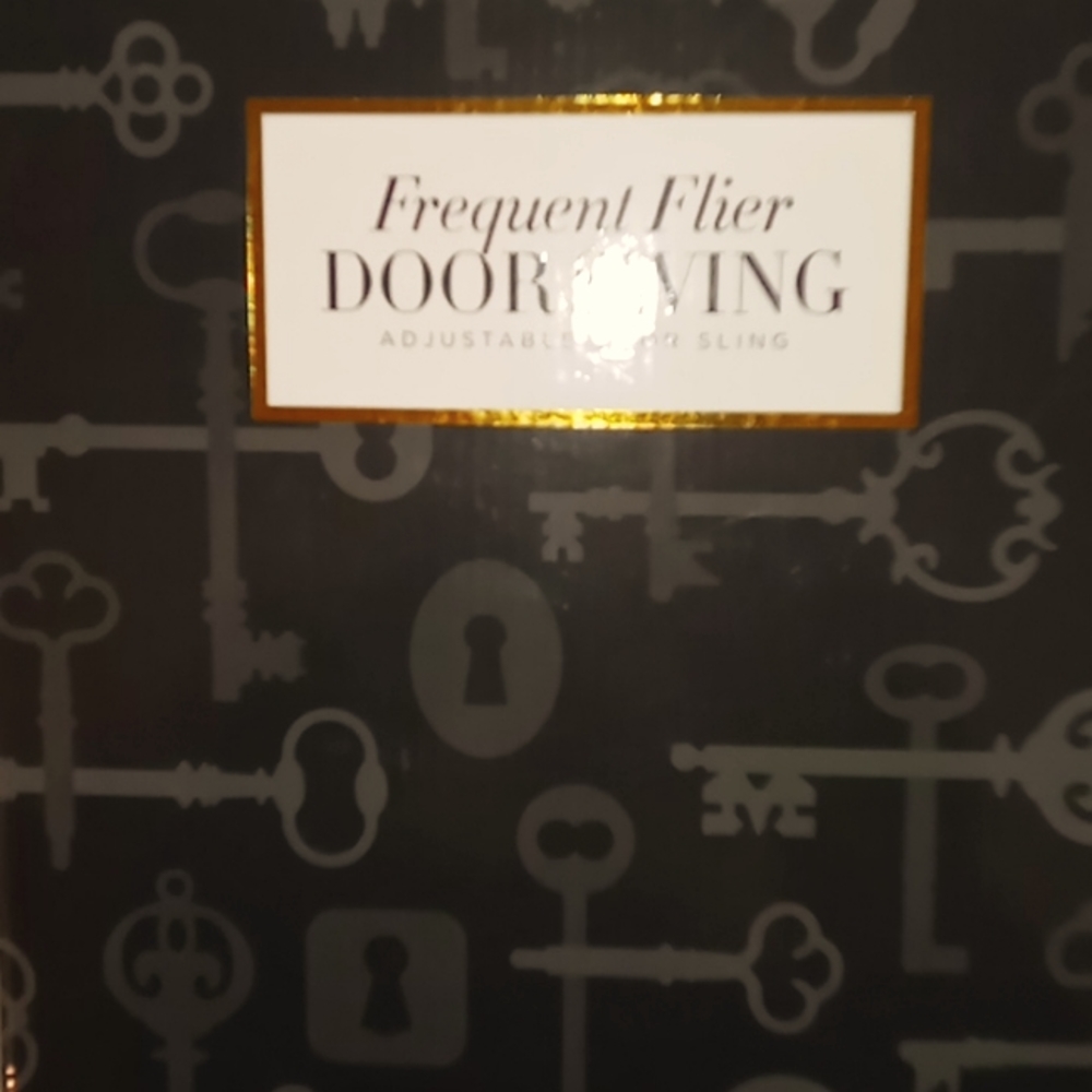 Frequent flyer door swing adjustable door sling
